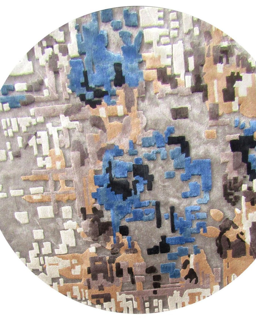 Pixel vloerkleed MZ-Y020, blauwe en bruine vlekken lopen in elkaar over als een uitvergrote, verweerde foto