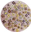 Sprankel vloerkleed MZ-Y055, kleine gouden en paarse bloemen liggen verspreid over een zacht blush vlak
